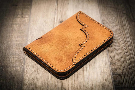 Saddle tan leather wallet, western vertical style, handmade in Texas by Bull Sheath Leather.