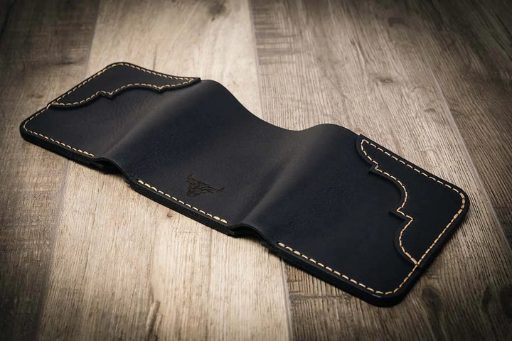 Trinity western trifold wallet in walnut brown leather, featuring intricate stitching and a subtle embossed logo.