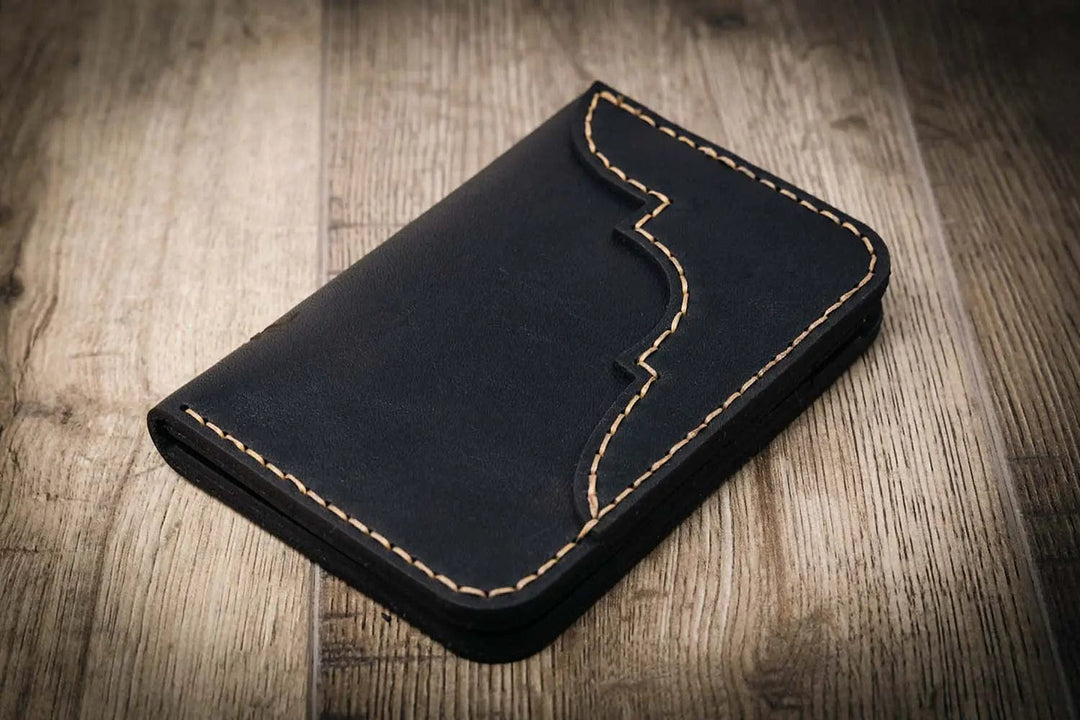 Western vertical wallet in black leather with tan stitching, handmade in the USA by Bull Sheath Leather.