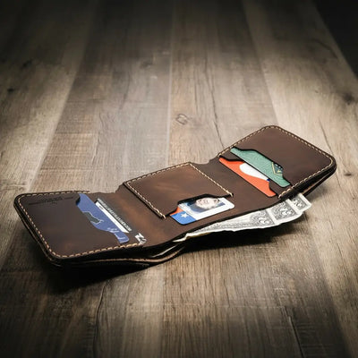 Trinity western trifold wallet in walnut brown leather, featuring multiple card slots and a cash compartment, handmade in the USA by Bull Sheath Leather.
