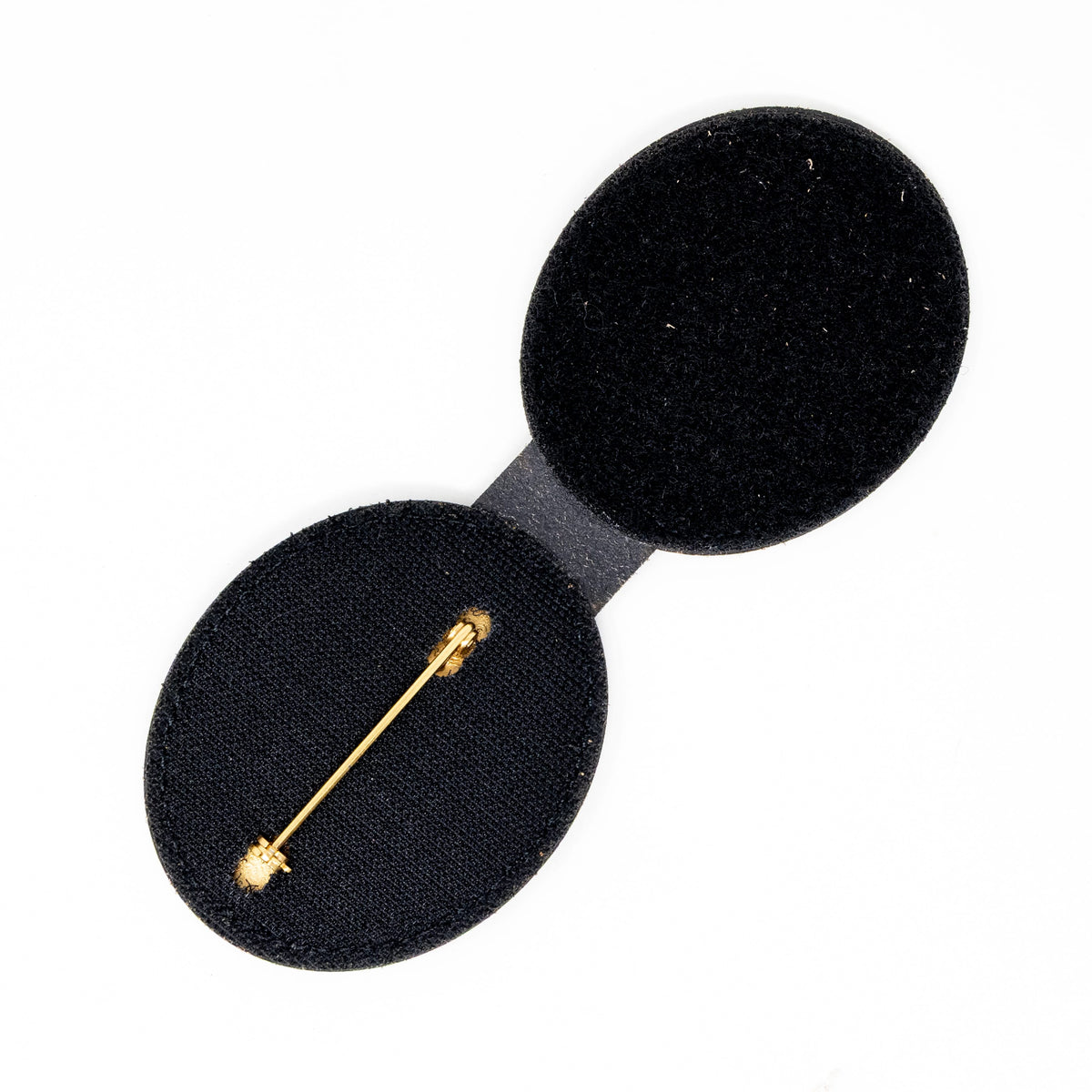 Belt badge holder in black full-grain leather, handmade in Texas by Bull Sheath Leather