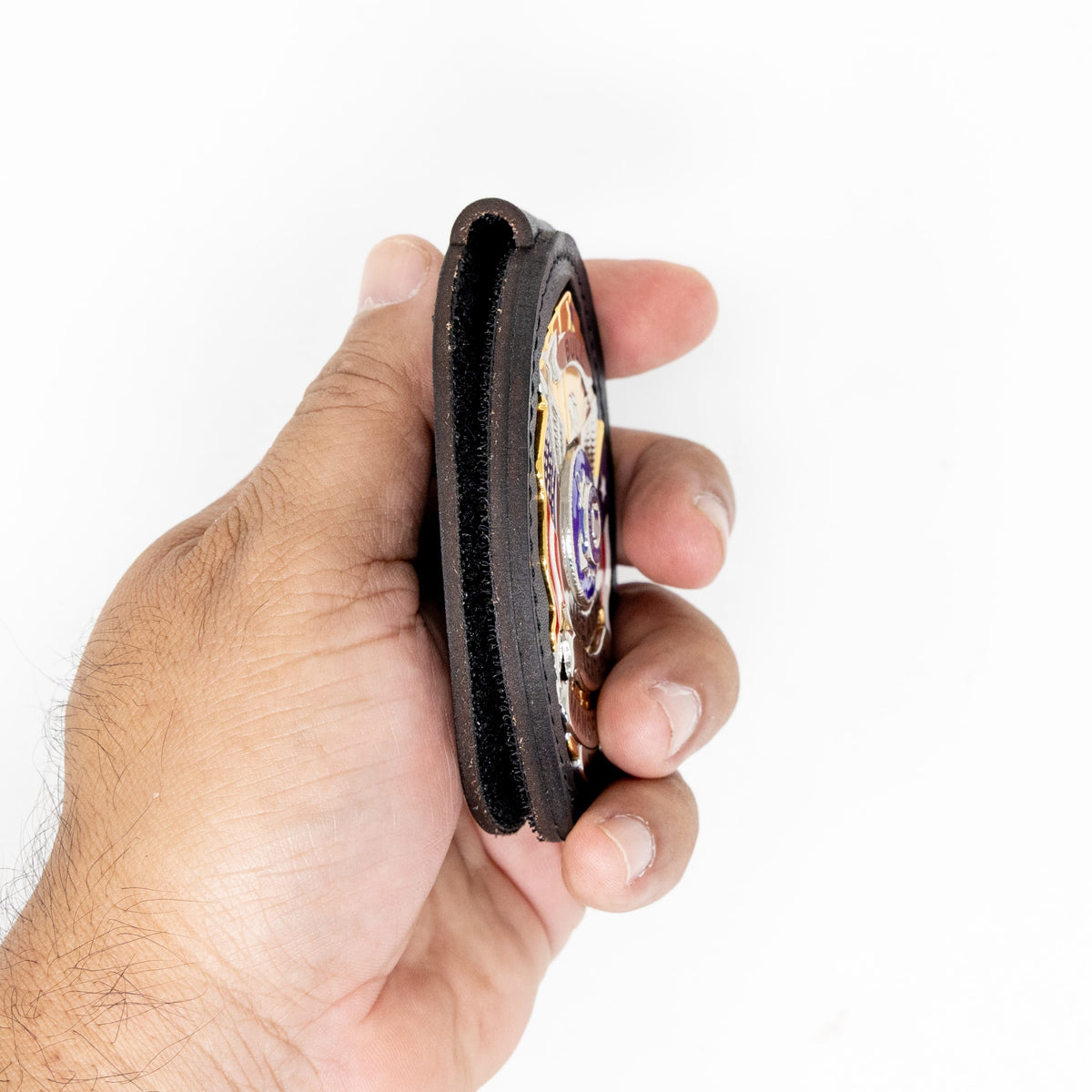 Belt badge holder in black full-grain leather, handmade in Texas by Bull Sheath Leather