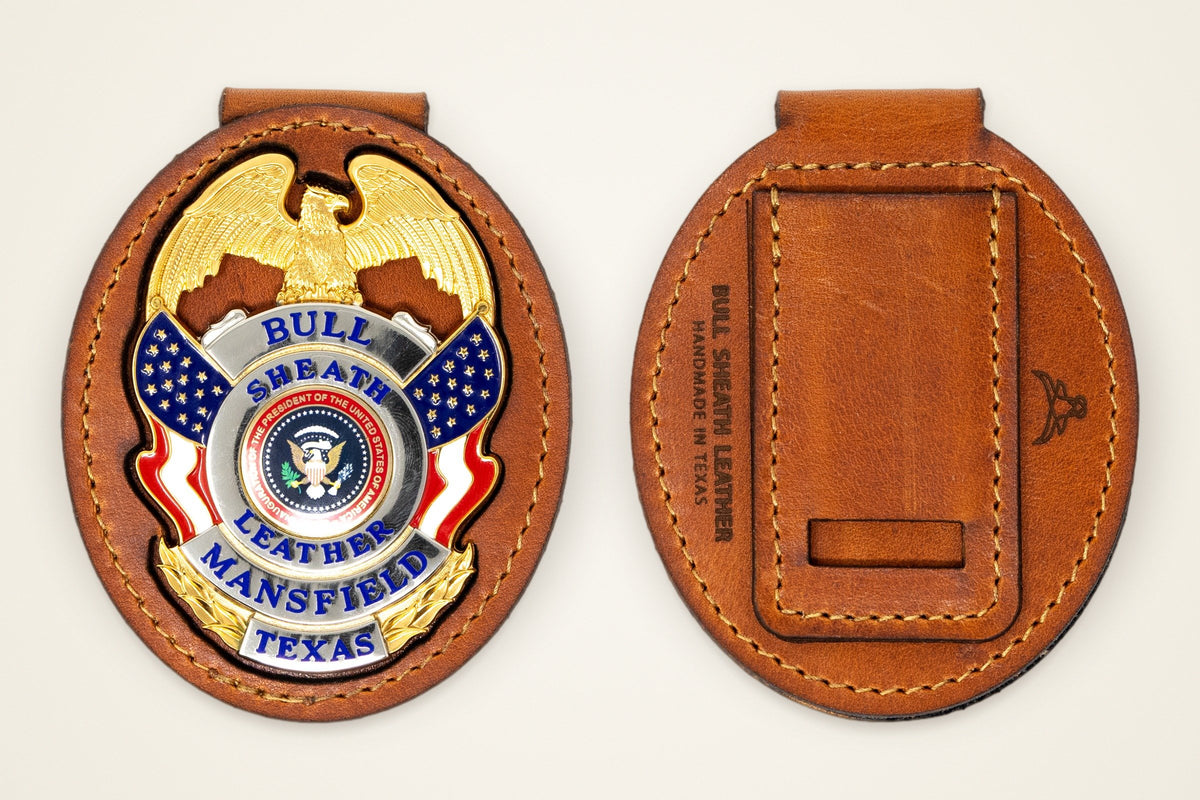 Belt Badge Holder on a cream background, showing its dedicated badge slot, horween full-grain leather, handmade in mansfield, texas, rides on your belt