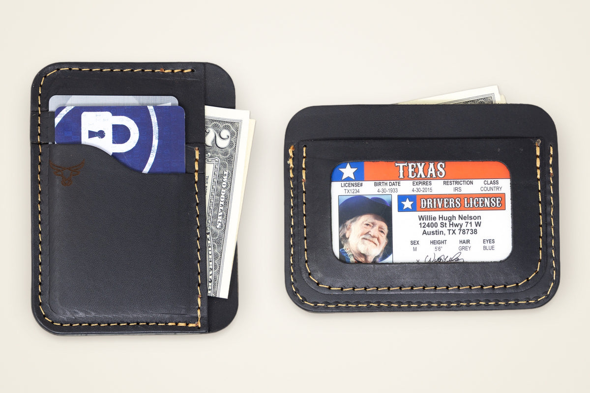 Mansfield Minimalist Wallet on a cream background, showing its three card slots, money slot, id window, five layers, burnished edges