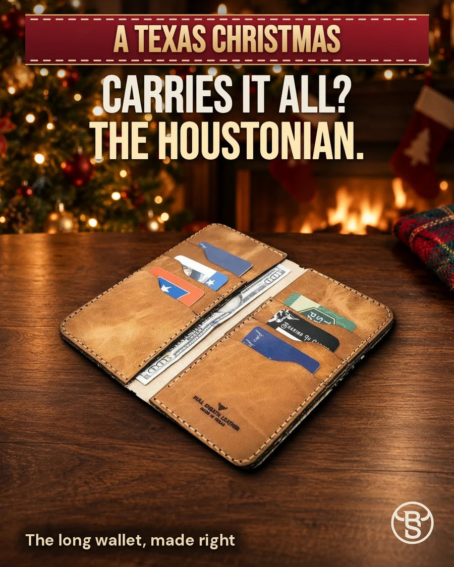 Carries it all? The Houstonian. The open Saddle Tan Houstonian, the long wallet made right